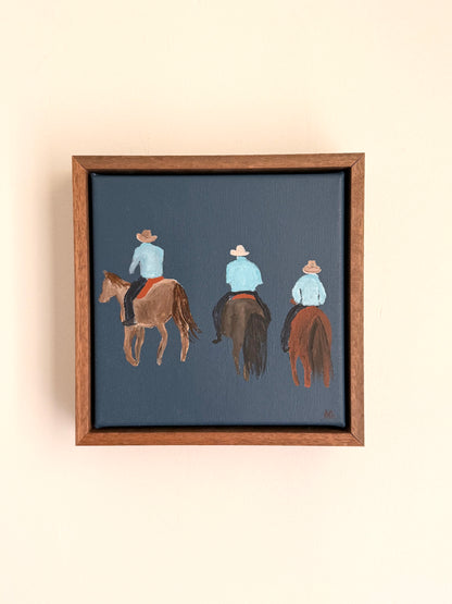 Three cowboys